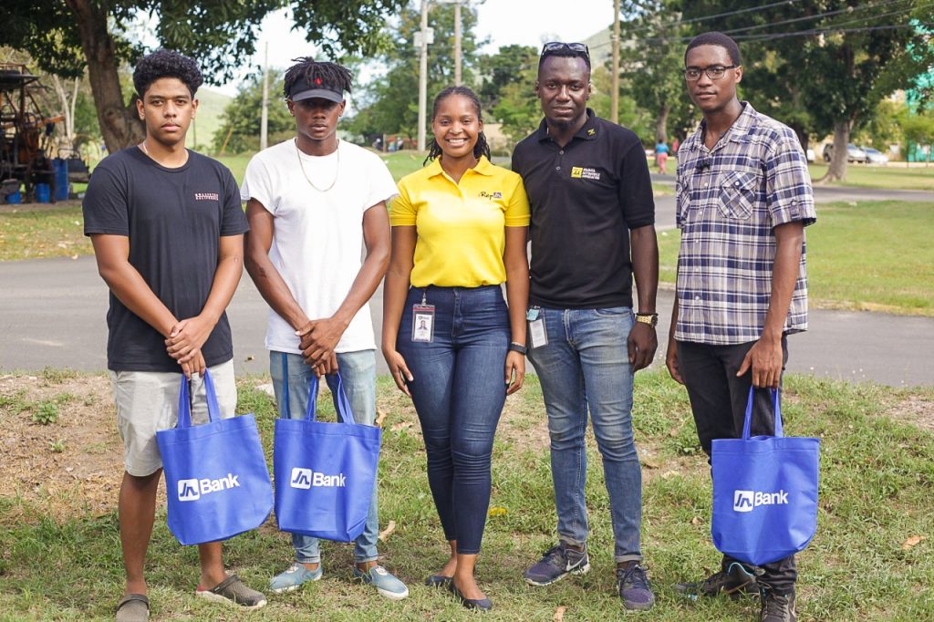 Winners of the JAA Parallel Parking competition Matthew Toyloy, first place; Philip Walters, fourth; Shonnoya Houston, JNWay Ambassador; Coswayne Samms, Marketing Officer, JAA; and Ryan Grant, fifth place winner.