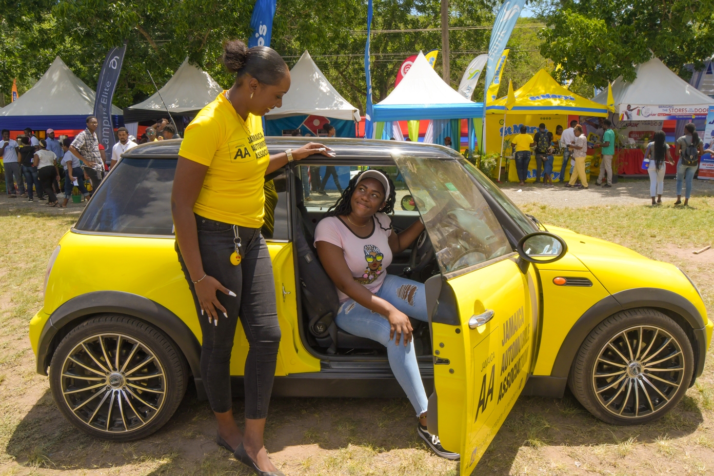 Lundie Martin (left), JAA Driving Academy coordinator, offers driving tips to Imani Smith, Faculty of Science and Technology, The University of The West Indies.